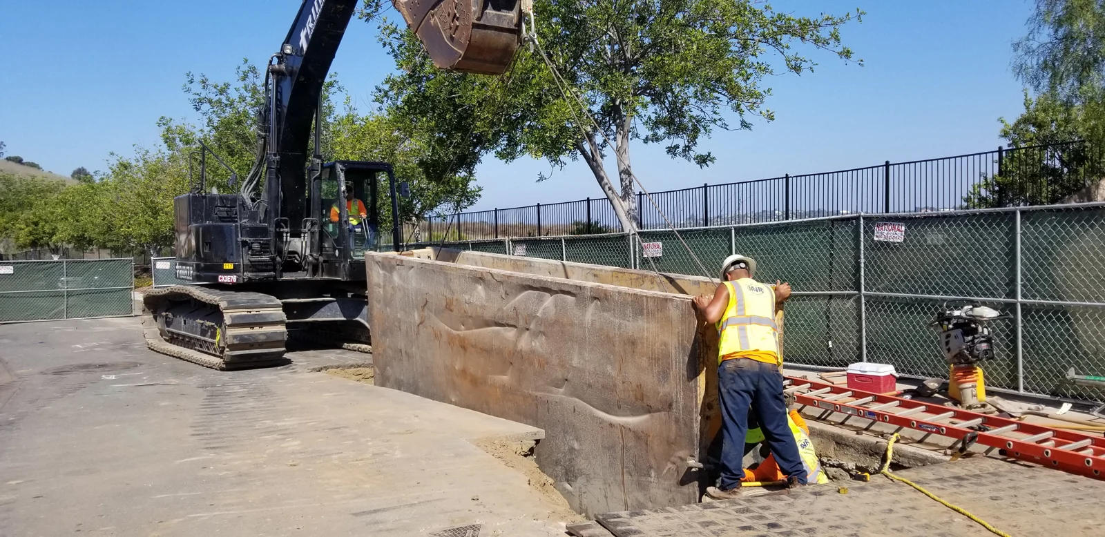Excavation crew and trench shoring equipment